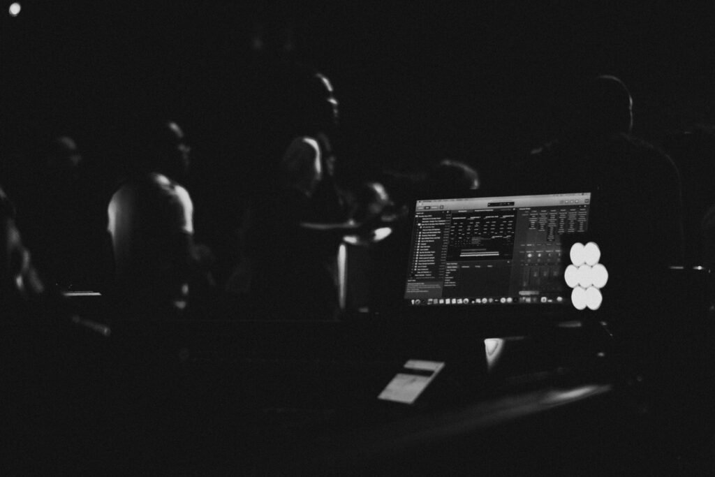 a laptop computer sitting on top of a table